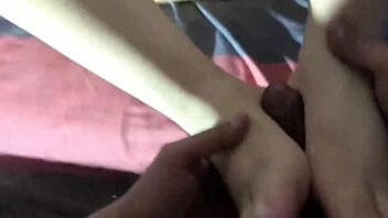 A footjob from a beautiful fat woman ends with a creampie and foot cream