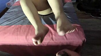 A footjob from a beautiful fat woman ends with a creampie and foot cream