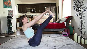 In this yoga lesson, the instructor guides a mature european woman through poses focusing on flexibility and balance.