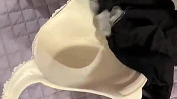 creamy cumshot lands on padded bra during wanking session