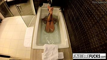 Jezebelle Bond Feels Aroused Masturbating In The Bath, Showing Big Tits And Wet Pussy