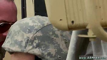 naked soldier in army engages in gay fuck amidst explosions and failures