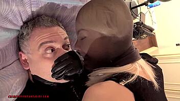 strong ukrainian blonde femdom dominates with rough hand over mouth in leather gloves for trailer