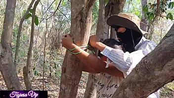 Teen Tigresavip gets tied up and anal fucked in the woods