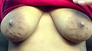 Busty ebony teases with natural tits in public