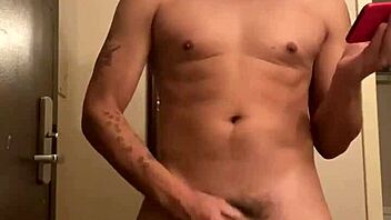 Gay boy jerks big black cock in hotel