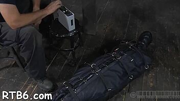 Watch a submissive man get bound and dominated in this rough BDSM scene
