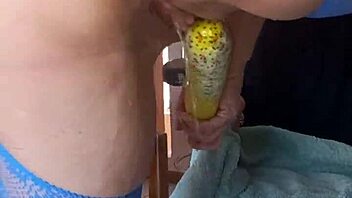 Horny milf masturbates and gets dominated with toys and a cucumber, squirting wildly