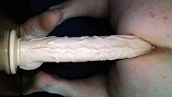 Ever seen a guy handle a big dildo? Watch him explore toys in this gay hardcore scene