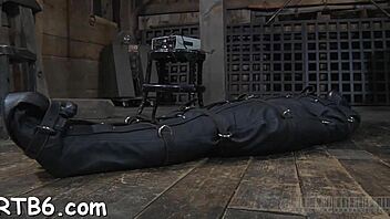 Watch a submissive man get bound and dominated in this rough BDSM scene