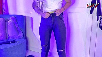 Desperate teen pisses on her black jeans in a fetish scene