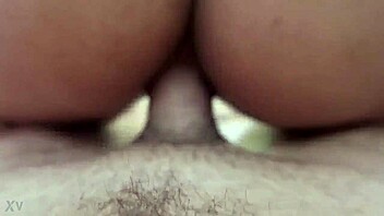 She's riding that big cock anal style, raw and intense, moaning loudly