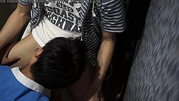 Gay men dancing in night club with cool asses!