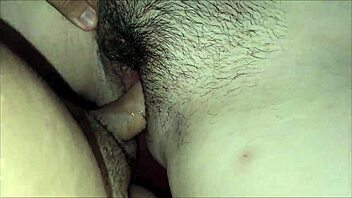 Juicy brunette gets a close-up view of her big pussy being filled