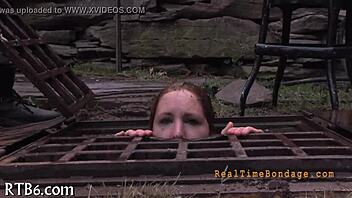 A cute girl is punished in restraints