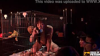 japanese babe trapped in cage eats and pisses before a crowd of guys. her hairy petite frame shocks!