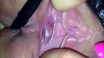 Amateur babe fingering herself to a squirting orgasm