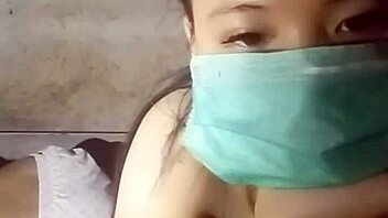Watch a stunning Asian girl with big tits dance and strip on live cam