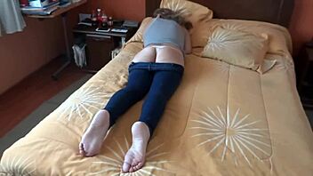 Beautiful girl gets turned on by her stepson's big cock and gives him a handjob