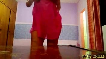 Wife doing naughty striptease on webcam while husband works