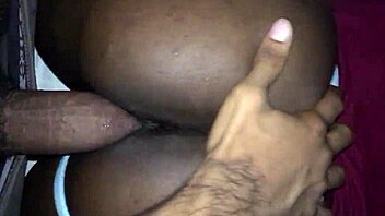 ebony couple engages in doggystyle position