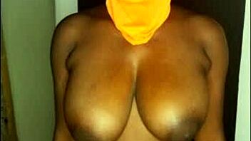 Ebony girlfriend's big tits and ass on display