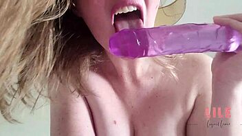 Blonde girlfriend asks, 'Want to see me masturbate with this naughty purple XL dildo?'