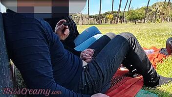 French teacher gives student a handjob in public park and gets caught on camera