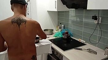 Naked cooking in the kitchen