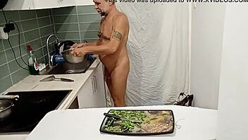 Naked cooking in the kitchen