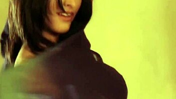 bollywood babe strips naked on the bed for handjob