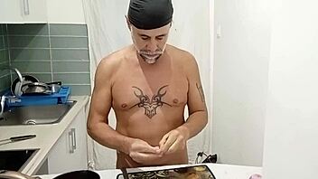 Naked cooking in the kitchen