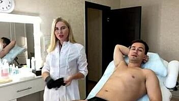 Horny blonde Sugarnadya gives footjob to young client in Cfnm video