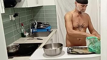 Naked cooking in the kitchen
