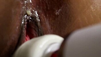 Watch kinky ebony lesbians finger, spank, and fuck asses hard