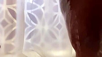 Cum on the shower head while bathing