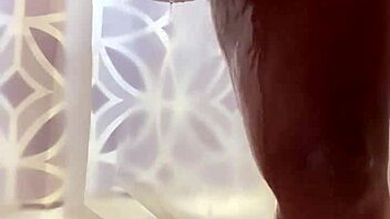 Cum on the shower head while bathing