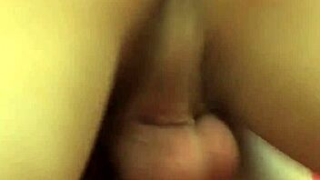 Two young gay men with monster cocks engage in raw sex in a small room