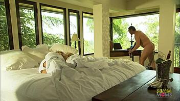 Every Weekend, He Invites Two Beautiful Milfs to Suck His Big Pecker in Bed