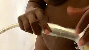 Cum on the shower head while bathing