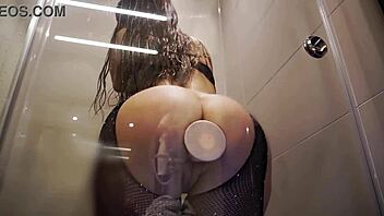 Big ass babe rides dildo in bathroom