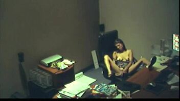 Office brunette girl fingering her wet pussy during break time