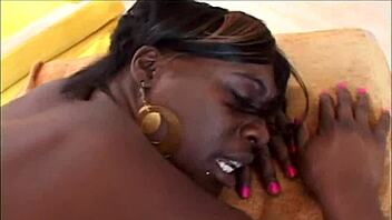 Amateur ebony with big tits gets her ass clapped by a big black cock