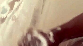 kay way relaxes in the shower