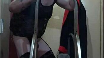 Bisexual sissy enjoys the taste of his own urine while standing on a ladder