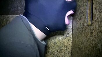 Gay amateur sucks on a big cock in gloryhole