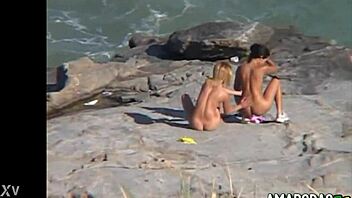 Amateur brunette and blonde share their naked bodies in public