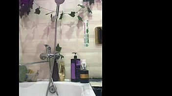 Hot teen 18+ enjoys fun in the shower with bathing and cumshots.