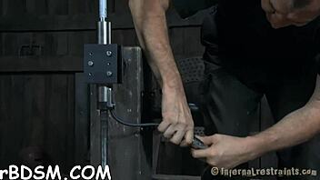 Bound Beauty Sucks Cock While Pussy Fucked in Cage