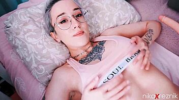 Feeling intense pleasure as the fuckmachine titfucks this cute teen with glasses and tattoos in pov